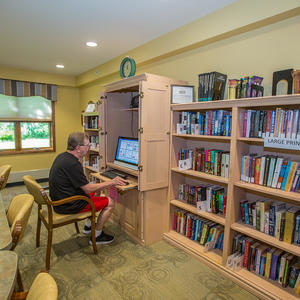 Man at Library Desk